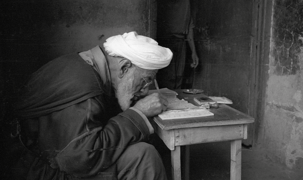 Leggere e scrivere. Fotografie di Melo Minnella